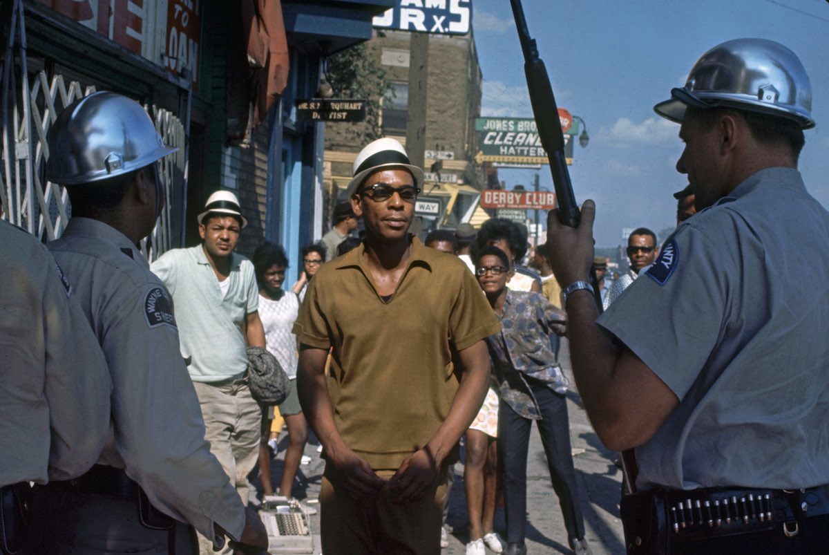 Subject: Detroit Police officers confronting African American people in the streets during the Race Riots, Detroit, Michigan July 1967 Photographer- Lee Balterman Time Inc Owned Merlin-1153177