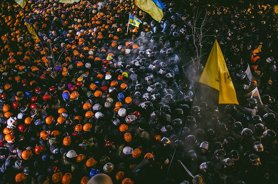 Peaceful opposition between protesters and riot police lasted all night. Hard power wasn’t applied by any of the parties. Kiev, Dec. 11, 2014.